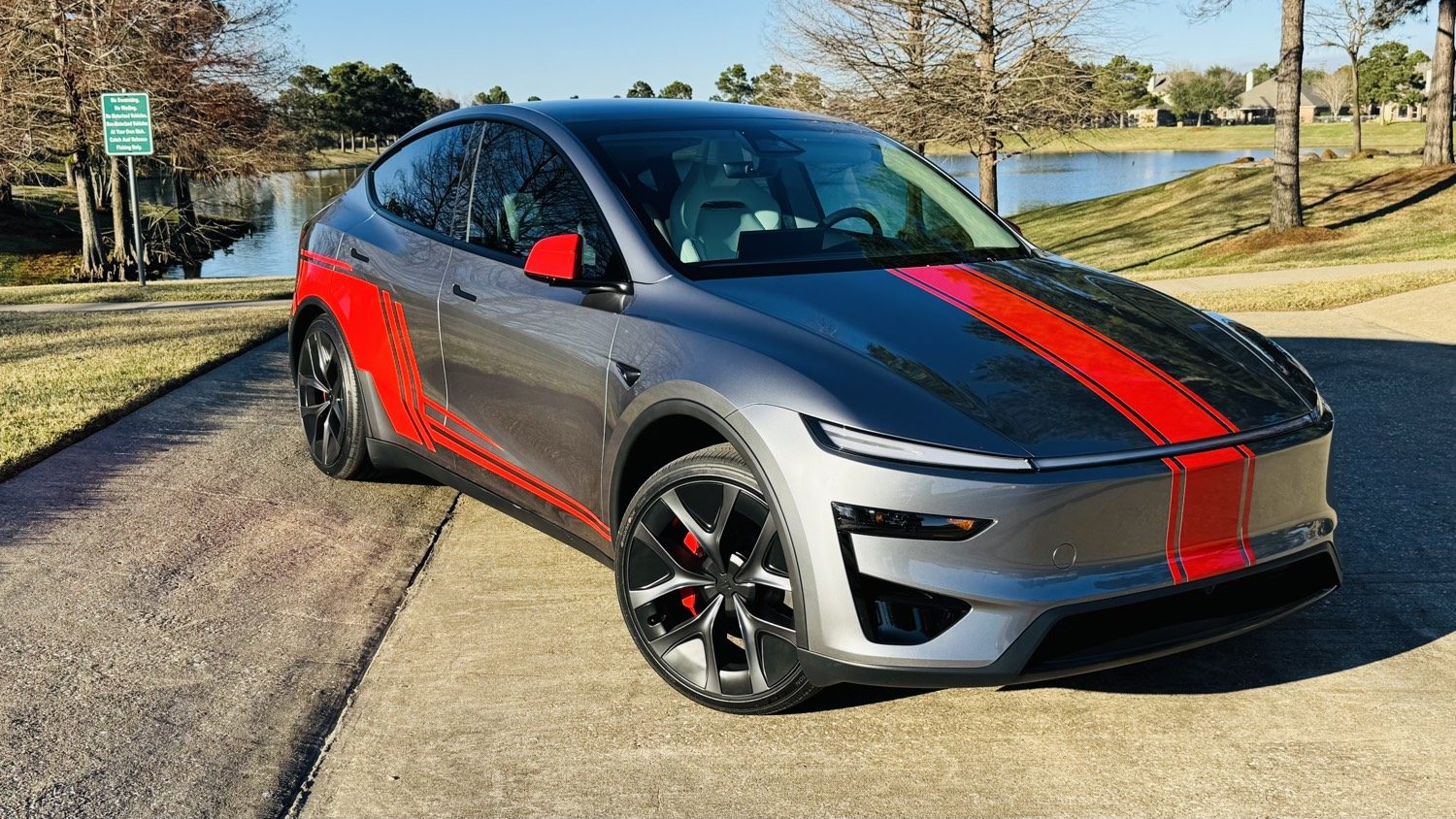 2026 Tesla Model Y Performance with red racing stripes